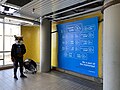 Photo area in Scarborough Centre Station with the background reading "Farewell Line 3" in various languages, as well as social media handles