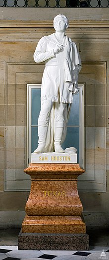 Marble statue of Sam Houston on a stone pedestal