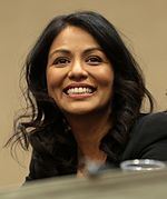 Karen David interprète Grace Mukherjee.