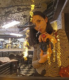 Nadia Rovderova Self portrait Cafe Favorite Rue Rivoli Paris 2014