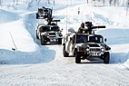 Tanks maneuvering in a winter landscape, a key part of WW3 operations