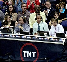 An NBA on TNT broadcast crew during a December 2008 game Reggie Miller TNT.jpg