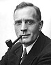 Studio portrait photograph of Edwin Powell Hubble (cropped).JPG