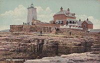 Iron Pot lighthouse with the Parkinson family home, circa 1910