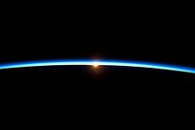 The Thin Blue Line photograph was taken from the International Space Station in 2009. Author Frank White's description of interviews with astronauts emphasized their perception of the "striking thinness of the atmosphere". Thin Line of Earth's Atmosphere and the Setting Sun.jpg