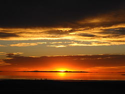 Sunset viewed from White Rock Bay, on the western shore of Antelope Island. Carrington Island is visible in the distance. Antelope island sunset.jpg