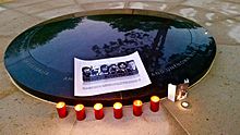 Candles burn to mark the 40th anniversary of their deaths, 2015. Balibo5memorial40thanniversary.jpg