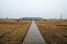 Entrance of the chengtoushan ruins.jpg