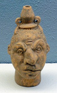 Jarrón con forma de cabeza de esclavo de época romana.