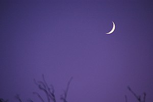 Waxing Crescent Moon Waxing crescent moon at dusk.