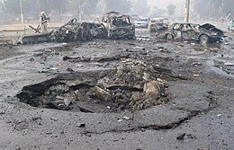 The result of a car bombing during the Iraq War Car bombing, Baghdad.jpg