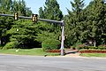 The entrance to the Cascades community along Cascades Parkway at Palisade Parkway. The Cascades logo can be seen in the lower right.