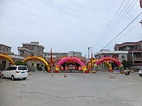 A neighbourhood folk shrine festooned for a festival, in Chongwu, Fujian. Chongwu Town - P1230259.JPG