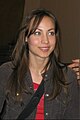 Courtney Ford, interprete di Christine Hill.