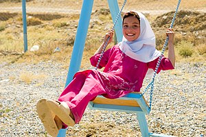 Youngh Afghan girl plays during the fourth Int...