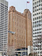 Üläkorged Guardian Building-sauvuz Detroitan finansižes rajonas om Uein-ümbrikon tobmuden sijaduz da ičezkalu (2022)