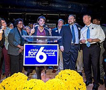 Washington (left) attends the Question 6 victory party, 2012 JLB 6323 (8186681666).jpg