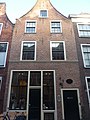 Huis met tudorbogen als ontlastingsboog