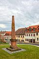 Postmeilensäule aus Rochlitzer Porphyr in Penig