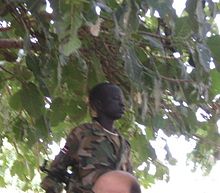 A child soldier of the Sudanese People's Liberation Army (2007) SPLA Child Soldier.jpg