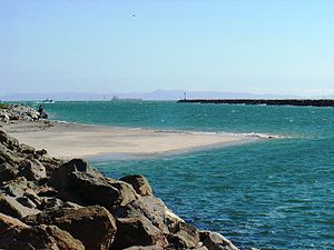 The San Gabriel River meeting the Pacific Ocea...