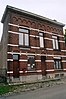 Gemeentehuis van Sint-Laureins-Berchem, gemeenteschool en onderwijzerswoning