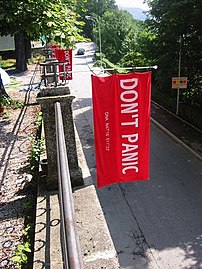 Towel with the words "Don't Panic" o...