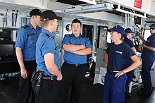 US coast guardsmen and Canadian navy sailors working together US and Canadian Coast Guard sailors, on the bridge, 120814-G-NB914-035.JPG