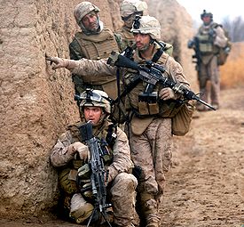 U.S. Marines and ANA soldiers on patrol during counterinsurgency operations in Marjah, Afghanistan, February 2010 6th Marine Rgt. on patrol in Marja 2010-02-22 crop.jpg