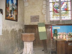 Les fonts baptismaux à Saint-Aubin.