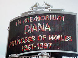 A message of condolence at Piccadilly Circus following her death, containing a typo (should be "in memoriam").