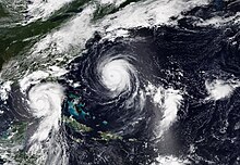 Two hurricanes on the right, Eleven and Gert on the left