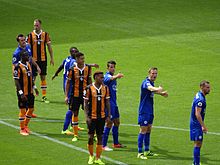 Hull City in the amber & black home kit Leicester Line (28337204214).jpg
