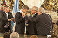 President–elect Mauricio Macri receives the presidential sash and staff from Provisional President of the Senate Federico Pinedo, instead of outgoing president Cristina Fernández de Kirchner in 2015