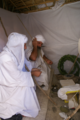 Priests reading the Baii Rahmi (the Great Prayer)