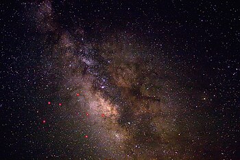 A view of the night sky near Sagittarius, enha...