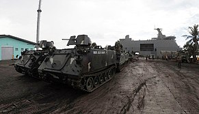 BRP Tarlac in Iligan offloading military units meant to augment government forces fighting in Marawi Navy offloads military vehicles, supplies in Iligan City 3.jpg