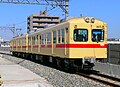 高架化された西鉄香椎駅付近を走る313形電車 （2007年3月2日撮影）