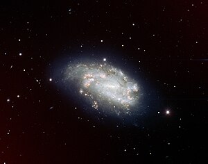 Supernova 2005dh and Spiral Galaxy NGC 1559.jpg