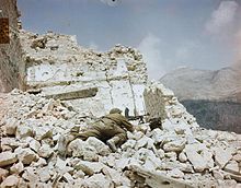 A British soldier with a Bren gun in the ruins of Monte Cassino The Campaign in Italy, May 1944 TR1800.jpg