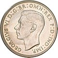 VI. György 1937-es ausztrál ezüst 1 crown-ja (1/4 font sterling) előoldala. Átmérője 38 mm.