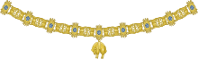 Gold and blue segmented chain with a gold sheep hanging from it