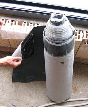 A roll of EPDM foil, used for waterproofing roofs
