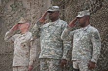 General Lloyd Austin, commander of United States Forces-Iraq with General James Mattis, commander of United States Central Command, during the United States Forces-Iraq end of mission ceremony on December 15, 2011. Both would later serve as Secretaries of Defense. End of mission ceremony DVIDS500735.jpg