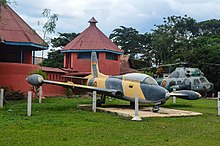 Ghana Air Force Aermacchi MB-326 at the Ghana Armed Forces (GAF) Museum in Kumasi, Ashanti Region, Ghana.. Ghana Air Force Historic Attack Aircraft and Attack Helicopter.jpg