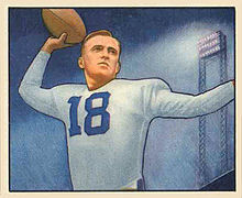 Football card illustration of Rauch wearing white jersey no. 18 and football pads (but no helmet), apparently preparing to pass the football.