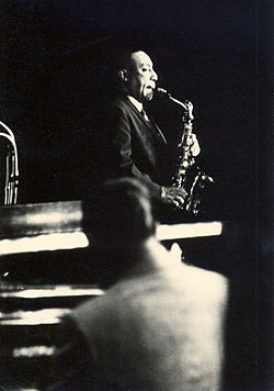 Artistic authenticity: The saxophonist Johnny Hodges at work, playing jazz. The philosopher Jean-Paul Sartre said that jazz music represents artistic freedom and personal authenticity. Johnny Hodges edit.jpg