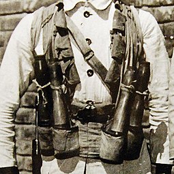 Chinese combat vest circa 1942 outfitted with four Chinese made stick grenades.