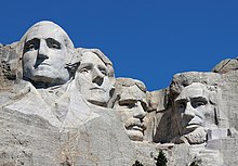 Mount Rushmore is located in the Black Hills of South Dakota. Mount Rushmore Closeup 2017.jpg