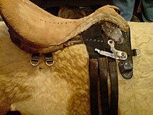 A saddle with most leather removed, showing tree and seat padding NakedSaddle!.jpg